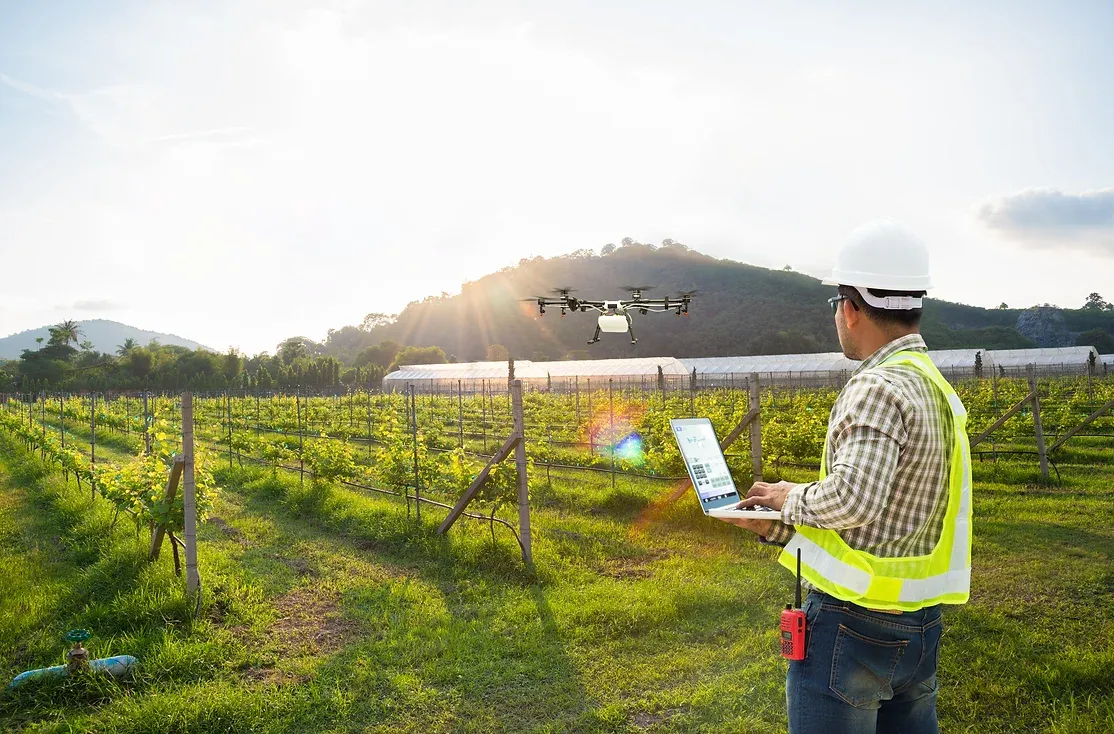 SMC-driven drone in operation over a field